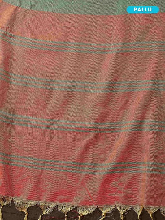 Maroon Pallu with green stripes on a green saree.